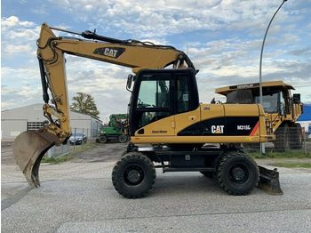 Pelle sur pneus CAT M315 D All Hydraulic German machine 30 Km/h