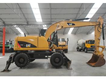 Pelle sur pneus Caterpillar M 313 D