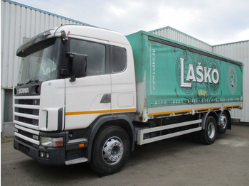 Camion à rideaux coulissants SCANIA R124