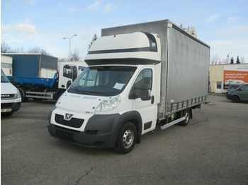 Véhicule utilitaire plateau baché Peugeot Boxer 3,0 l HDi