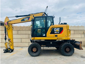 Pelle sur pneus CATERPILLAR
