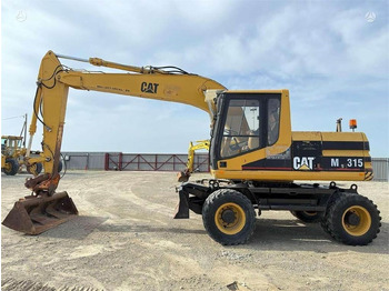 Pelle sur pneus CATERPILLAR M315