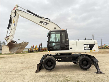 Pelle sur pneus CATERPILLAR M322D
