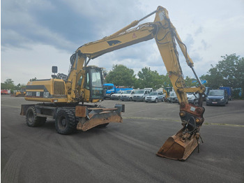 Pelle sur pneus CAT M315 Mobilbagger mit Pratzen und Schild: photos 4