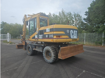 Pelle sur pneus CAT M315 Mobilbagger mit Pratzen und Schild: photos 2