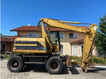 Pelle sur pneus Caterpillar M 312: photos 4
