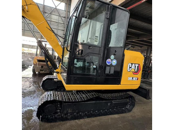 Pelle sur chenille CAT 305.5E: photos 2