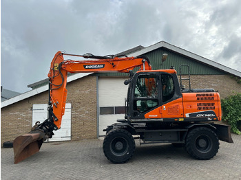 Pelle sur pneus DOOSAN DX140W-5