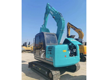 Pelle sur chenille Kobelco 75: photos 3