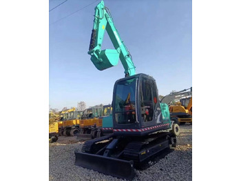 Pelle sur chenille Kobelco 75: photos 5