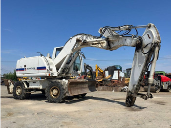 Pelle sur pneus NEW HOLLAND