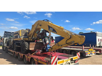 Pelle sur pneus CATERPILLAR M312