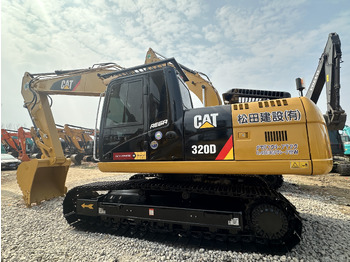 Pelle sur pneus CATERPILLAR 320D2