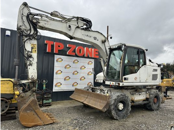 Pelle sur pneus VOLVO EW140D