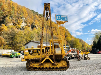 Poseur de canalisations CATERPILLAR