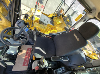 Pelle sur pneus Komatsu PW118MR-11: photos 3