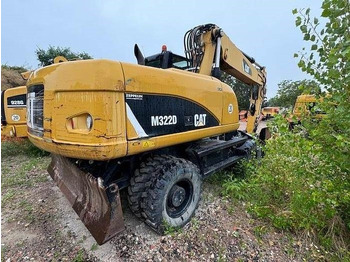 Pelle sur pneus CAT M 322 D: photos 4