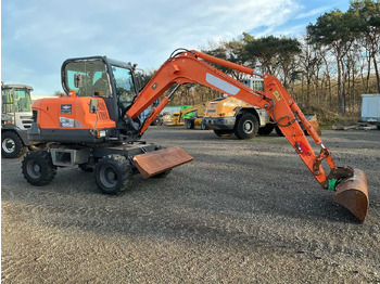 Pelle DOOSAN DX55