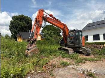 Pelle sur chenille Hitachi ZX135 US-6: photos 3