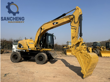 Pelle sur pneus CATERPILLAR M320