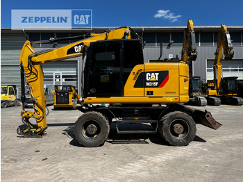 Pelle sur pneus CATERPILLAR M315F