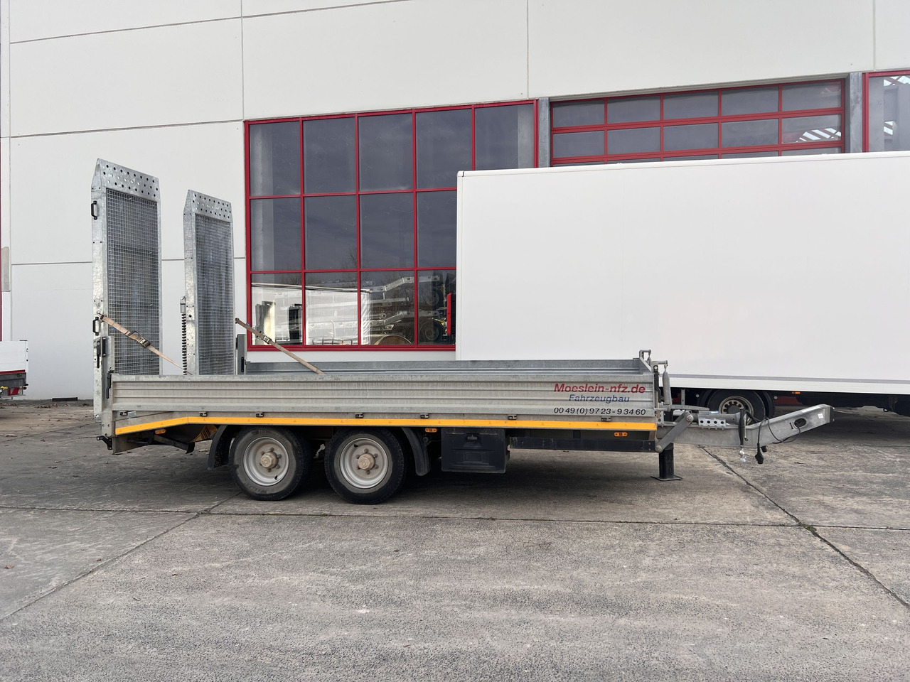 Möslein TTS 11 Schwebheim Tandemtieflader, Breite Rampen, Wenig Benutzt - Remorque porte-engin surbaissée: photos 1 Möslein TTS 11 Schwebheim Tandemtieflader, Breite Rampen, Wenig Benutzt - Remorque porte-engin surbaissée: photos 1