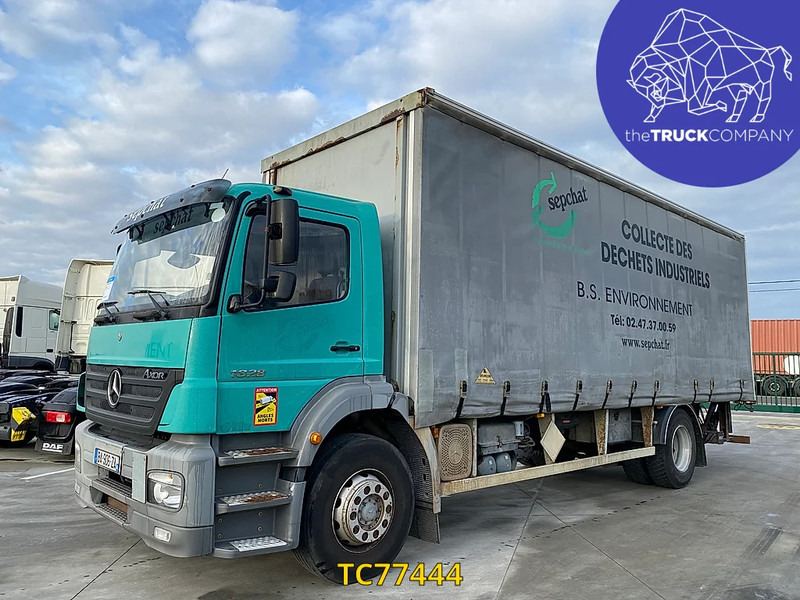 Mercedes-Benz Axor 1828 - Camion à rideaux coulissants: photos 1 Mercedes-Benz Axor 1828 - Camion à rideaux coulissants: photos 1