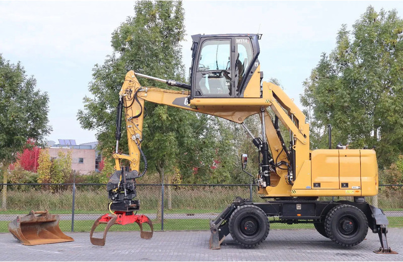 Caterpillar M314 07A | ELEVATING GRAB | ROTOTILT | BSS | GRAB | BUCKET - Pelle sur pneus: photos 1 Caterpillar M314 07A | ELEVATING GRAB | ROTOTILT | BSS | GRAB | BUCKET - Pelle sur pneus: photos 1