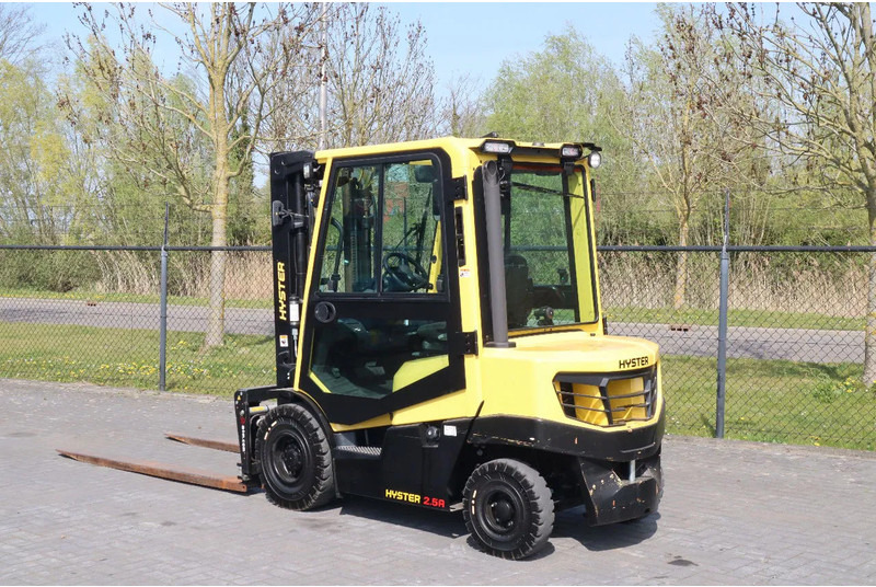 Hyster H2.5 A | BOOM SUSPENSION | SIDESHIFT | FORK EXTENTIONS | FORK POSITIONERS - Chariot élévateur diesel: photos 3 Hyster H2.5 A | BOOM SUSPENSION | SIDESHIFT | FORK EXTENTIONS | FORK POSITIONERS - Chariot élévateur diesel: photos 3