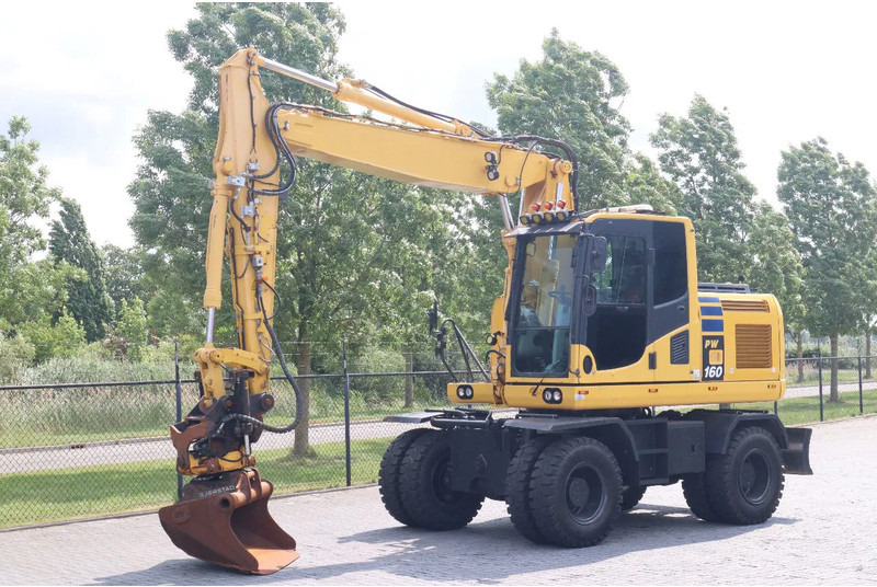 Komatsu PW 160-10 | ROTOTILT | NEW TIRES - Pelle sur pneus: photos 2 Komatsu PW 160-10 | ROTOTILT | NEW TIRES - Pelle sur pneus: photos 2