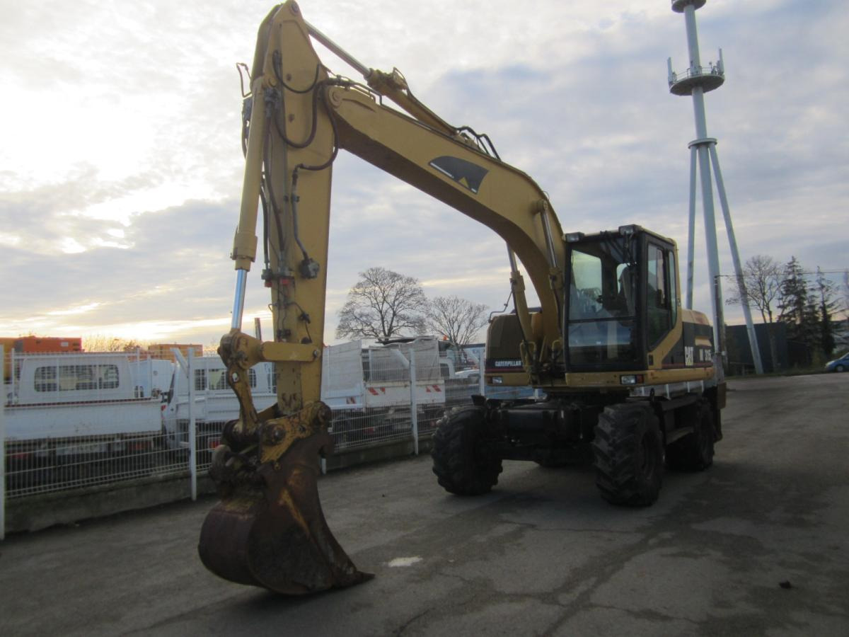 Caterpillar M315 - Pelle sur pneus: photos 2 Caterpillar M315 - Pelle sur pneus: photos 2