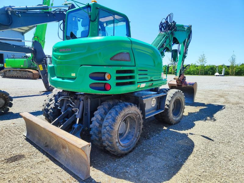 Takeuchi TB295W - Pelle sur pneus: photos 4 Takeuchi TB295W - Pelle sur pneus: photos 4