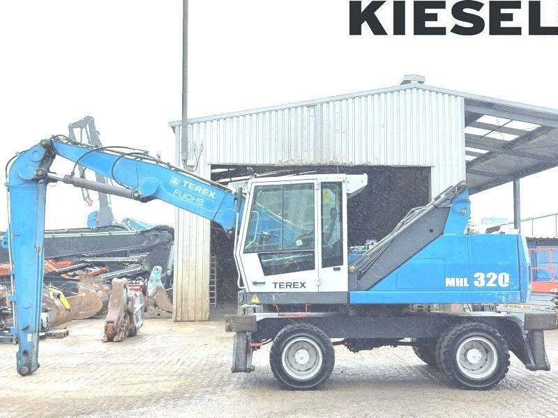 Fuchs MHL 320 D - Pelle de manutention: photos 1 Fuchs MHL 320 D - Pelle de manutention: photos 1