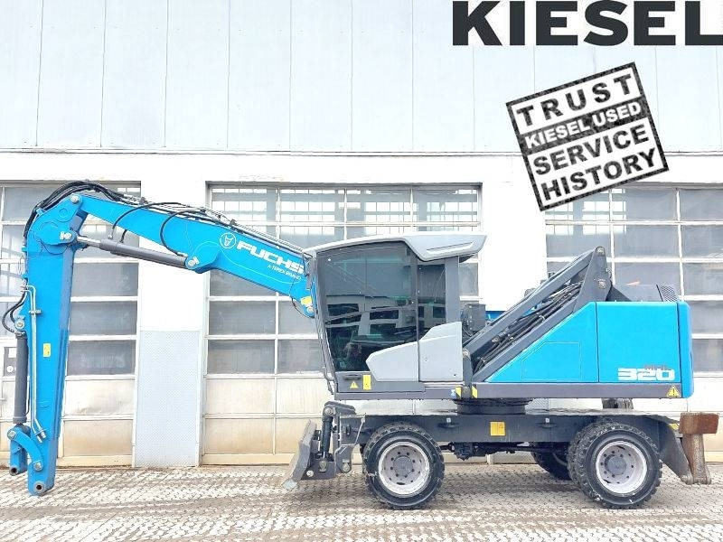 Fuchs MHL 320 F  - Pelle de manutention: photos 1 Fuchs MHL 320 F  - Pelle de manutention: photos 1
