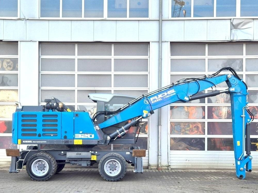 Fuchs MHL 320 F - Pelle de manutention: photos 5 Fuchs MHL 320 F - Pelle de manutention: photos 5