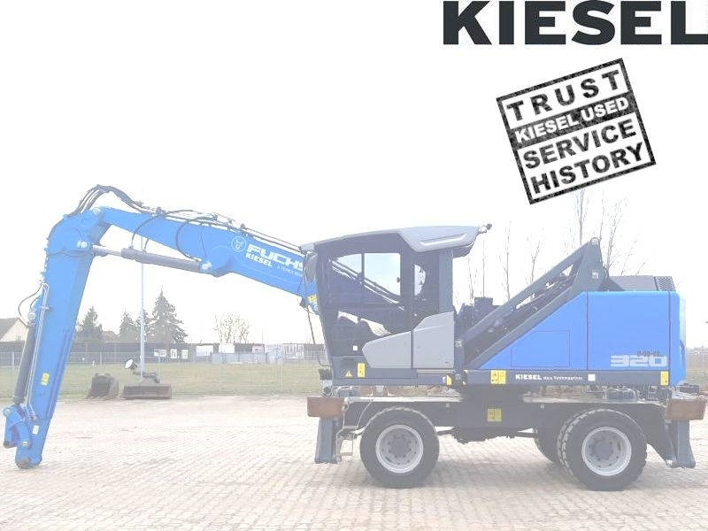 Fuchs MHL 320 F - Pelle de manutention: photos 1 Fuchs MHL 320 F - Pelle de manutention: photos 1