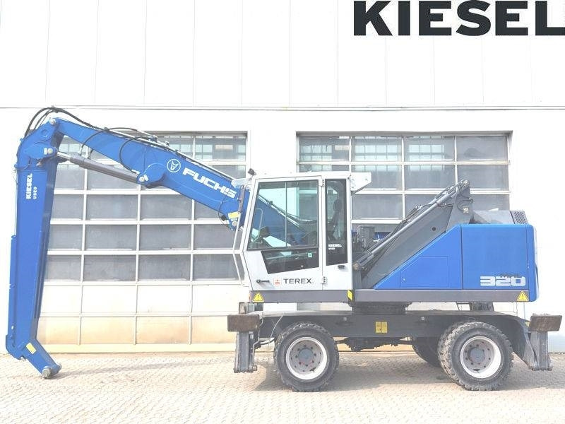 Fuchs MHL 320 F - Pelle de manutention: photos 1 Fuchs MHL 320 F - Pelle de manutention: photos 1