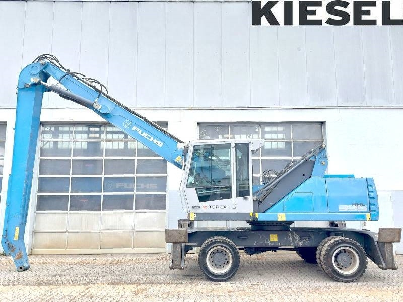 Fuchs MHL 335 E - Pelle de manutention: photos 1 Fuchs MHL 335 E - Pelle de manutention: photos 1