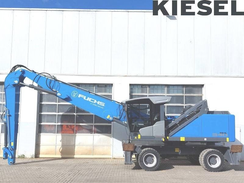 Fuchs MHL 340 F - Pelle de manutention: photos 1 Fuchs MHL 340 F - Pelle de manutention: photos 1