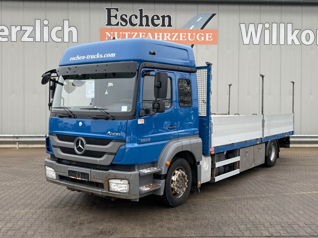 Mercedes-Benz Axor 1829 LL 6,55m Pritsche*6 Sitze*Klima*AHK - Camion plateau: photos 1 Mercedes-Benz Axor 1829 LL 6,55m Pritsche*6 Sitze*Klima*AHK - Camion plateau: photos 1
