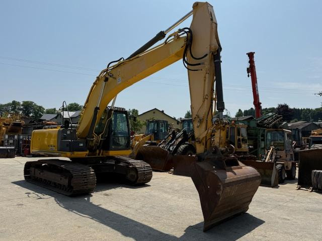 New Holland Kobelco E 215 C - Pelle sur chenille: photos 2 New Holland Kobelco E 215 C - Pelle sur chenille: photos 2