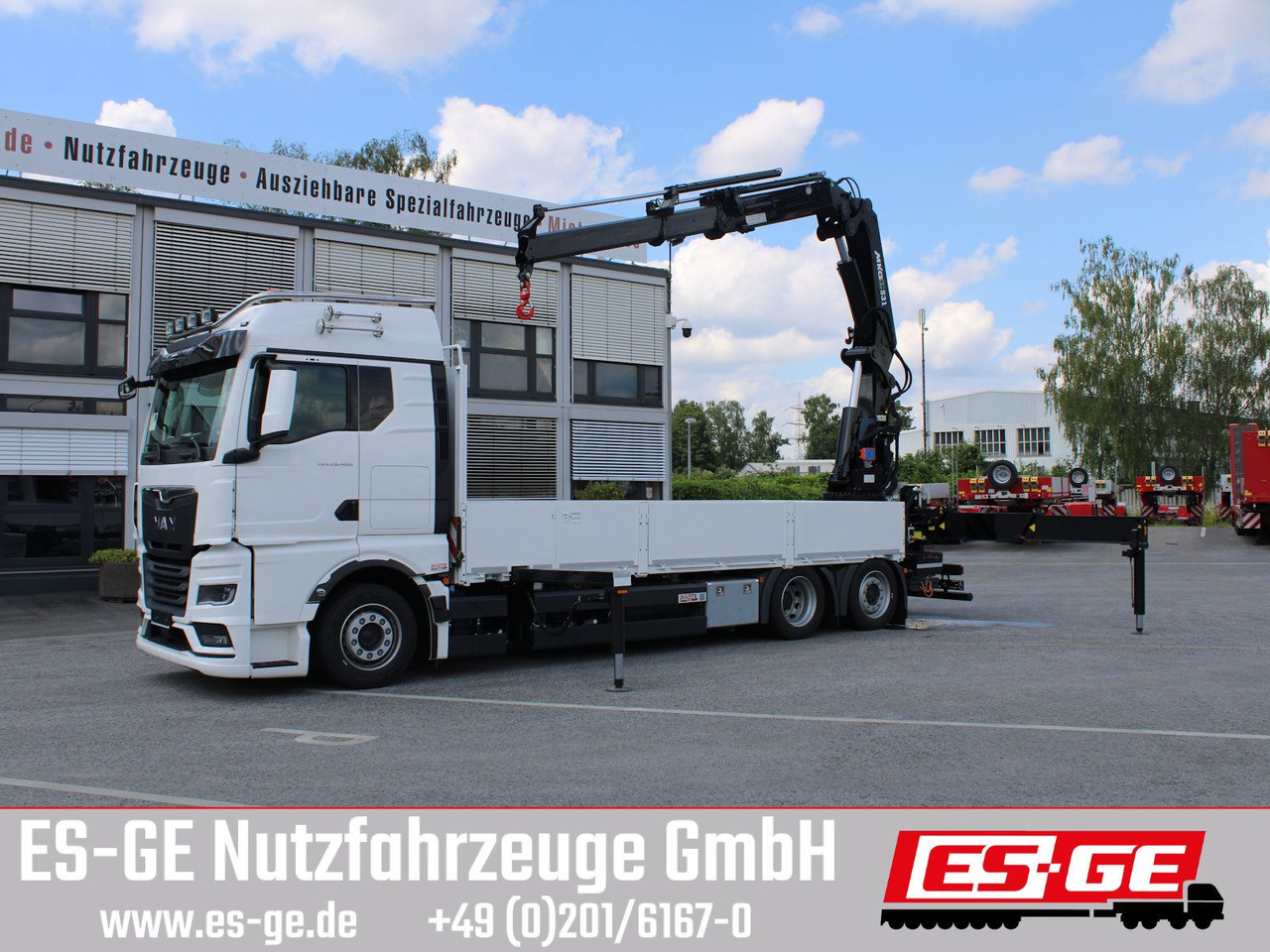 MAN TGX 26.480 6x2-4 LL CH mit MKG HLK531 a5 - Camion plateau, Camion grue: photos 1 MAN TGX 26.480 6x2-4 LL CH mit MKG HLK531 a5 - Camion plateau, Camion grue: photos 1