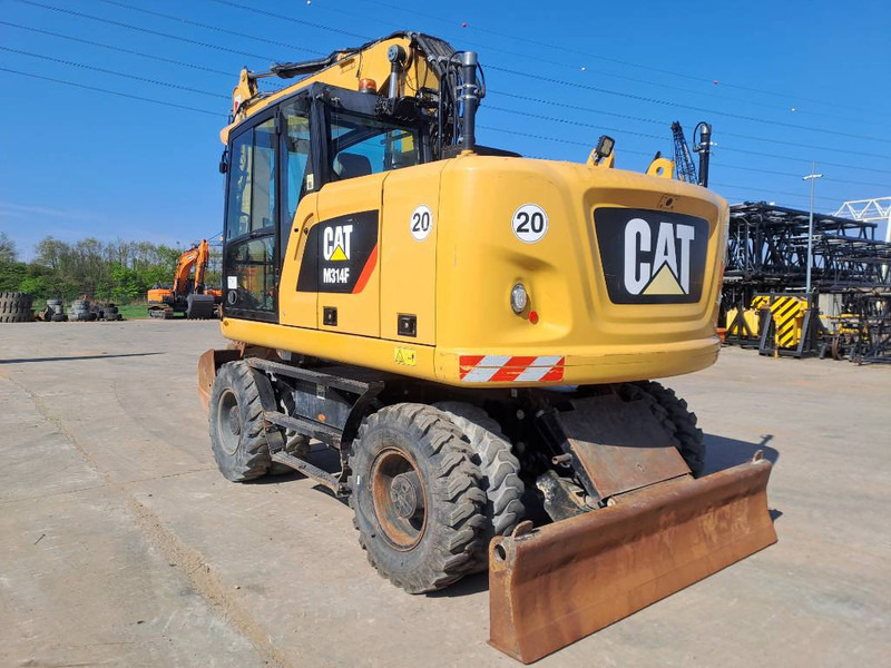 Cat M314F - Pelle sur pneus: photos 2 Cat M314F - Pelle sur pneus: photos 2
