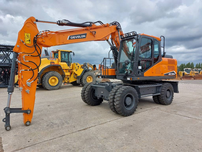 Develon DX 140 W-7 - Pelle sur pneus: photos 2 Develon DX 140 W-7 - Pelle sur pneus: photos 2