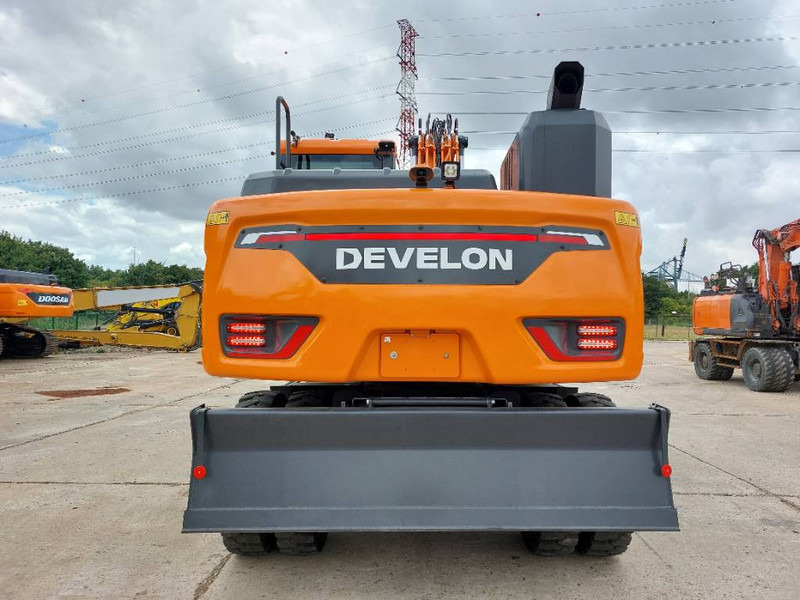 Develon DX 140 W-7 - Pelle sur pneus: photos 5 Develon DX 140 W-7 - Pelle sur pneus: photos 5