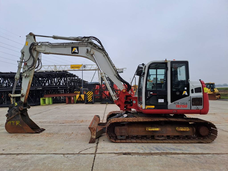 Takeuchi TB2150 - Pelle sur chenille: photos 1 Takeuchi TB2150 - Pelle sur chenille: photos 1