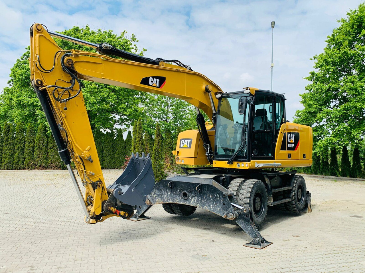 CAT M318F Mobilbagger *5.845 h *Schnellwechsel - Pelle sur pneus: photos 1 CAT M318F Mobilbagger *5.845 h *Schnellwechsel - Pelle sur pneus: photos 1
