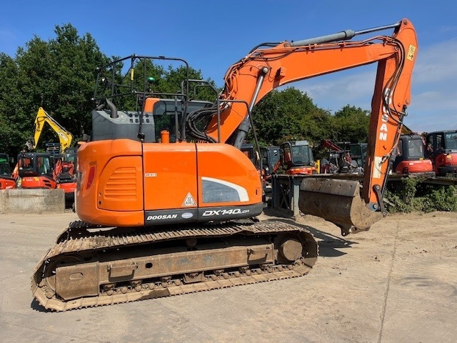 Doosan DX 140 LCR-5 - Pelle sur chenille: photos 1 Doosan DX 140 LCR-5 - Pelle sur chenille: photos 1