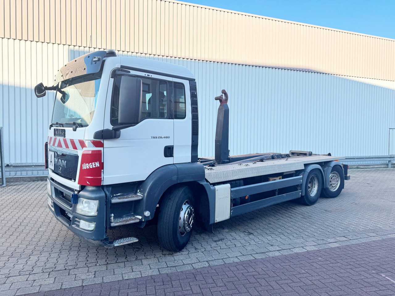 MAN TGS 26.480 6x2-4 BL TGS 26.480 6x2-4 BL, Lenk-Liftachse, VDL Abrollkipper bis 7m Container - Camion ampliroll: photos 1 MAN TGS 26.480 6x2-4 BL TGS 26.480 6x2-4 BL, Lenk-Liftachse, VDL Abrollkipper bis 7m Container - Camion ampliroll: photos 1