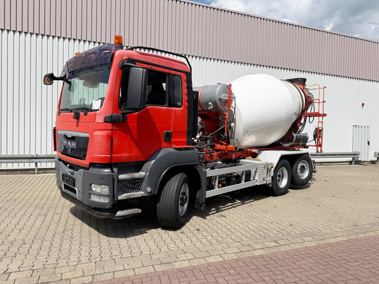 MAN TGS 26.480 6x4H-4 BL TGS 26.480 6x4H-4 BL, Liebherr HTM 704, Multilift Abroller HydroDrive, Lenk-/Liftachse, Wechselfahrzeug - Camion malaxeur: photos 1 MAN TGS 26.480 6x4H-4 BL TGS 26.480 6x4H-4 BL, Liebherr HTM 704, Multilift Abroller HydroDrive, Lenk-/Liftachse, Wechselfahrzeug - Camion malaxeur: photos 1